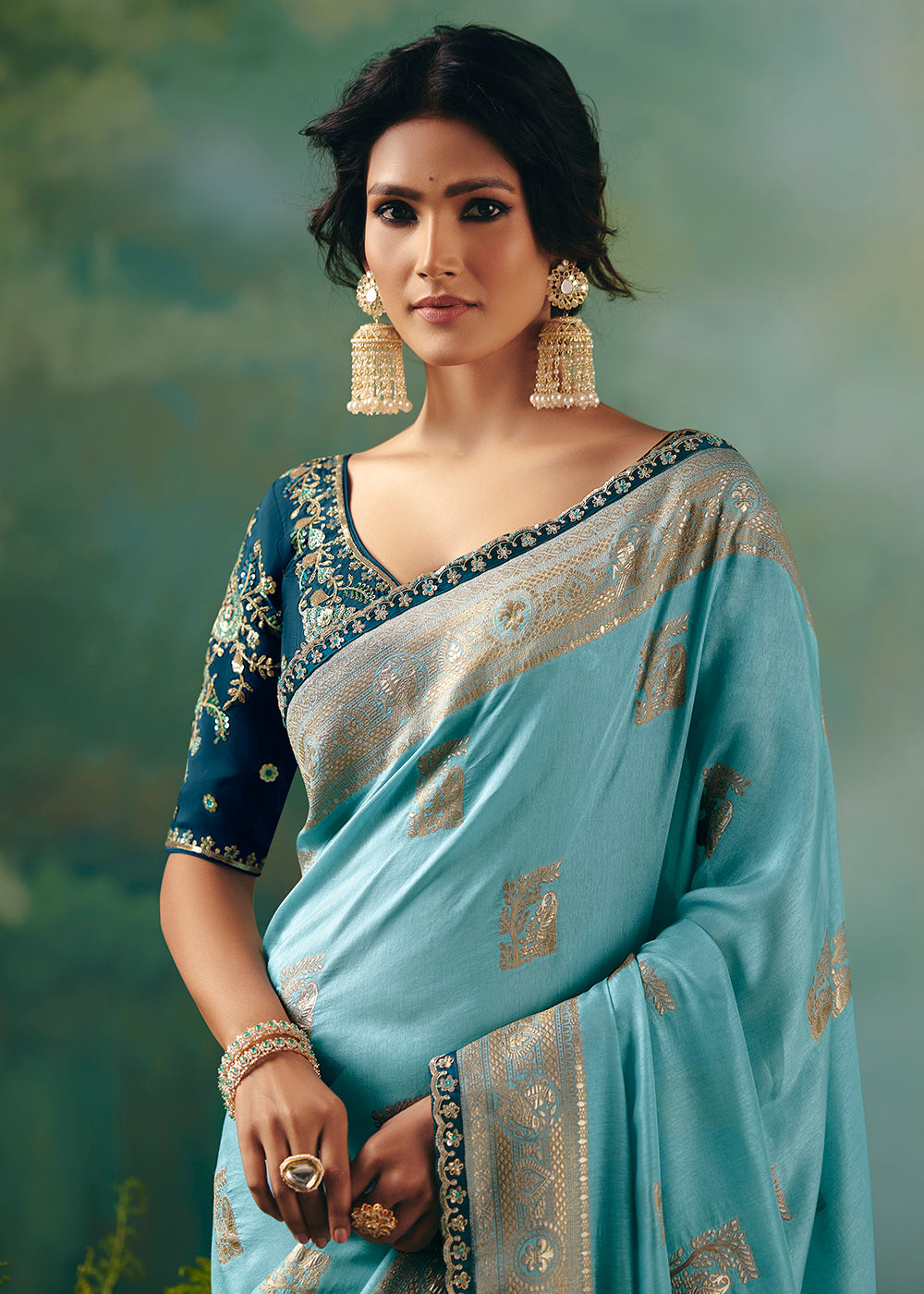 Buy Fancy Blue Premium Dola Viscose Silk Wedding Wear Saree Online in US, UK, Canada, France, Germany, Denmark, Spain, Belgium, Sweden & Worldwide at Empress.