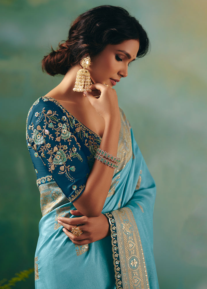 Buy Fancy Blue Premium Dola Viscose Silk Wedding Wear Saree Online in US, UK, Canada, France, Germany, Denmark, Spain, Belgium, Sweden & Worldwide at Empress.