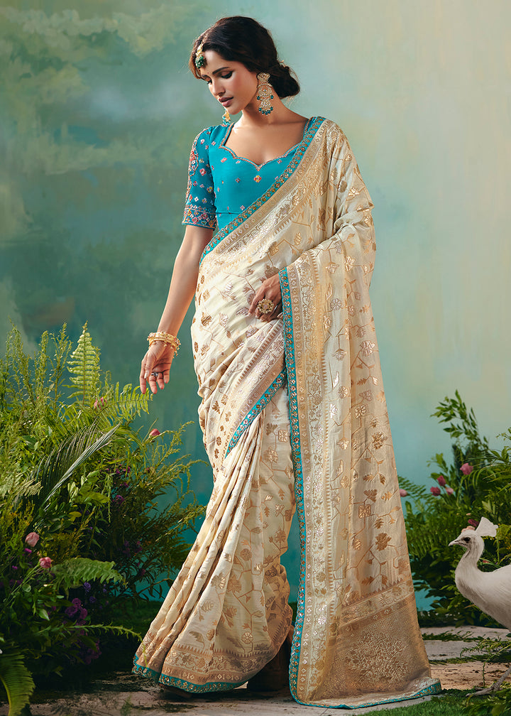 Buy Fancy Cream Premium Dola Viscose Silk Wedding Wear Saree Online in US, UK, Canada, France, Germany, Denmark, Spain, Belgium, Sweden & Worldwide at Empress.