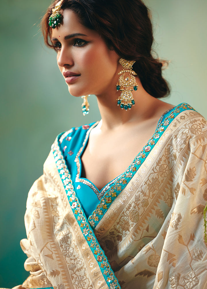 Buy Fancy Cream Premium Dola Viscose Silk Wedding Wear Saree Online in US, UK, Canada, France, Germany, Denmark, Spain, Belgium, Sweden & Worldwide at Empress.