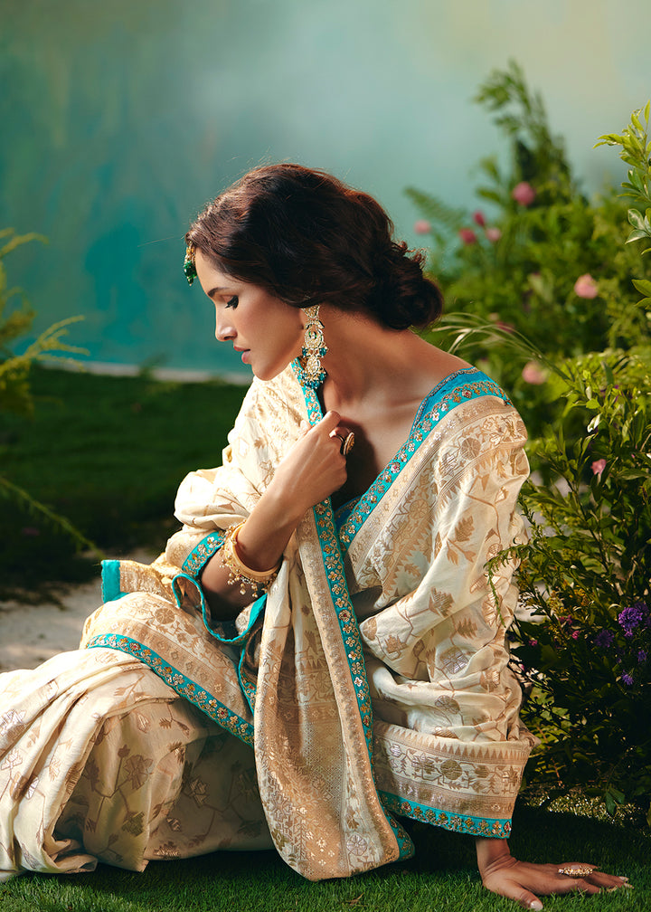 Buy Fancy Cream Premium Dola Viscose Silk Wedding Wear Saree Online in US, UK, Canada, France, Germany, Denmark, Spain, Belgium, Sweden & Worldwide at Empress.