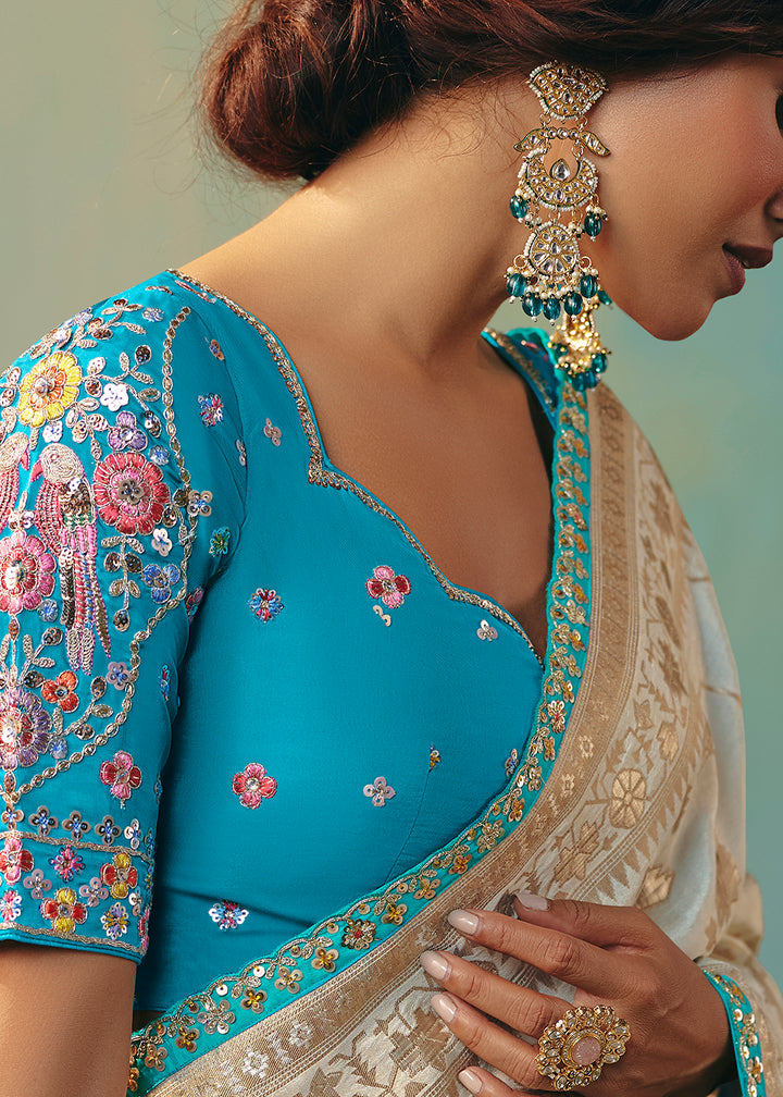 Buy Fancy Cream Premium Dola Viscose Silk Wedding Wear Saree Online in US, UK, Canada, France, Germany, Denmark, Spain, Belgium, Sweden & Worldwide at Empress.