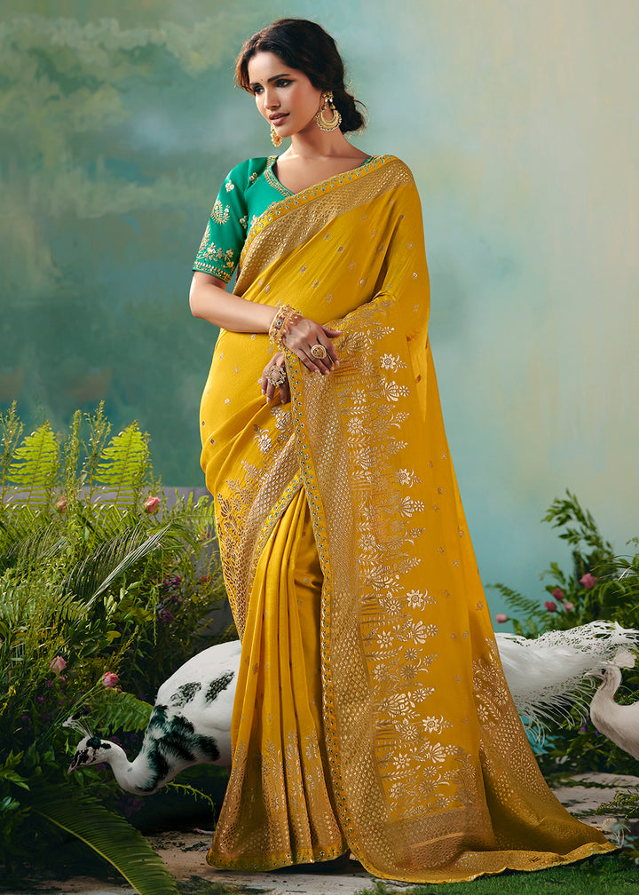 Buy Fancy Yellow Premium Dola Viscose Silk Wedding Wear Saree Online in US, UK, Canada, France, Germany, Denmark, Spain, Belgium, Sweden & Worldwide at Empress.