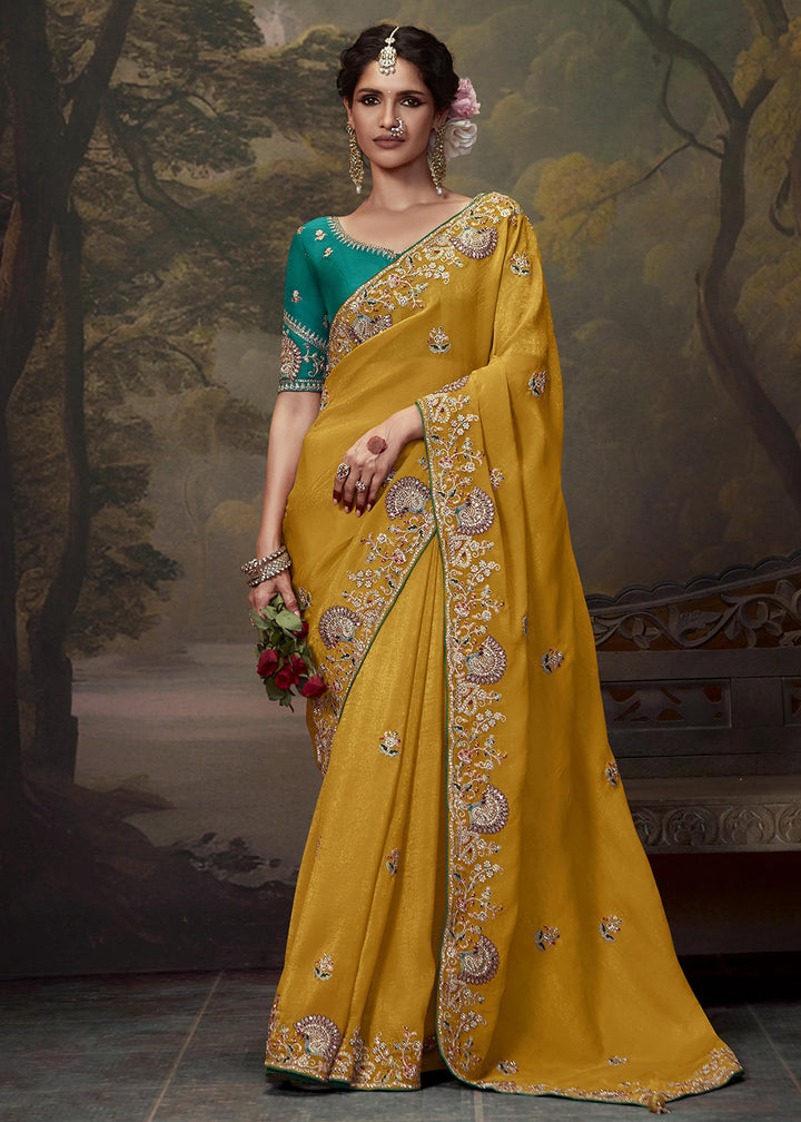 Buy Now Yellow Fancy Fabric Embroidered Festive Saree Online in USA, UK, France, Germany, Canada & Worldwide at Empress Clothing.