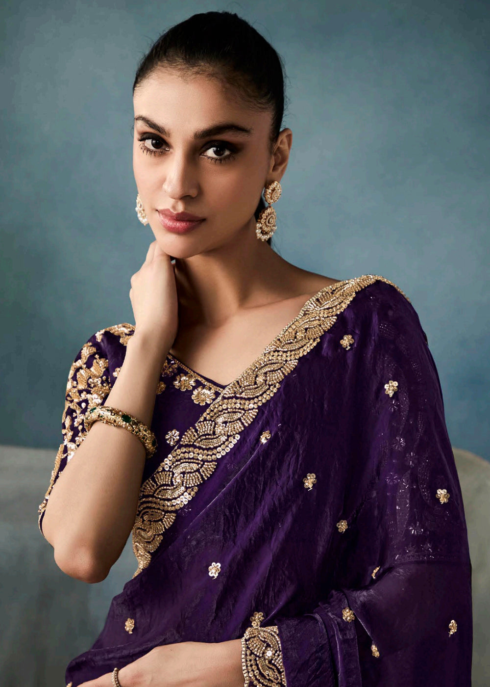 Radiant Purple tissue saree with intricate handwork & cutwork embroidery. Includes matching blouse piece. Perfect for wedding & festivals. Shop Now.