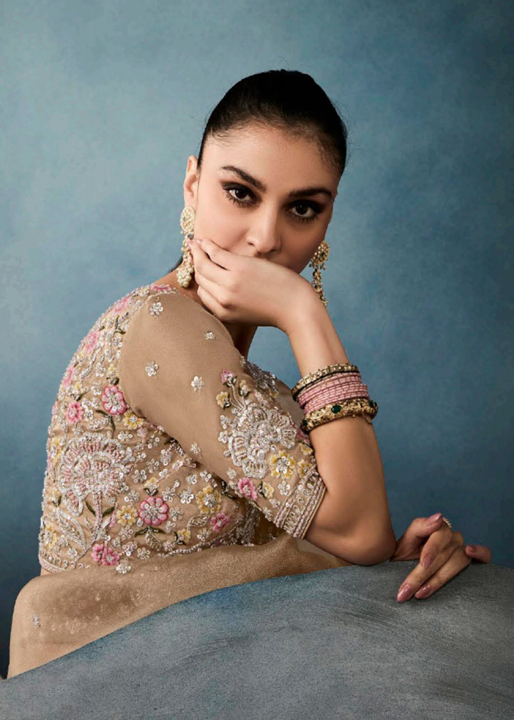 Radiant Beige tissue saree with intricate handwork & cutwork embroidery. Includes matching blouse piece. Perfect for wedding & festivals. Shop Now.