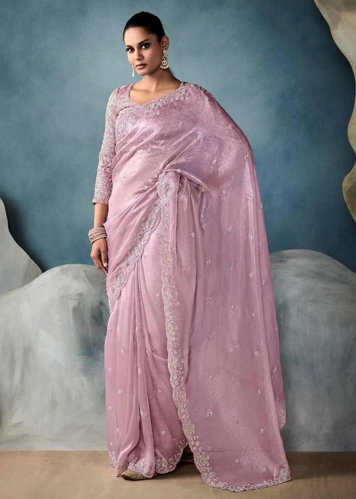 Radiant Pink tissue saree with intricate handwork & cutwork embroidery. Includes matching blouse piece. Perfect for wedding & festivals. Shop Now.