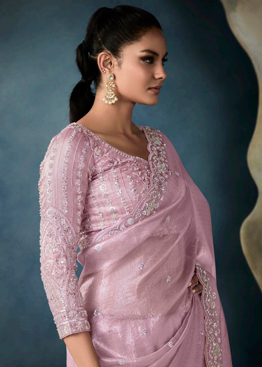 Radiant Pink tissue saree with intricate handwork & cutwork embroidery. Includes matching blouse piece. Perfect for wedding & festivals. Shop Now.