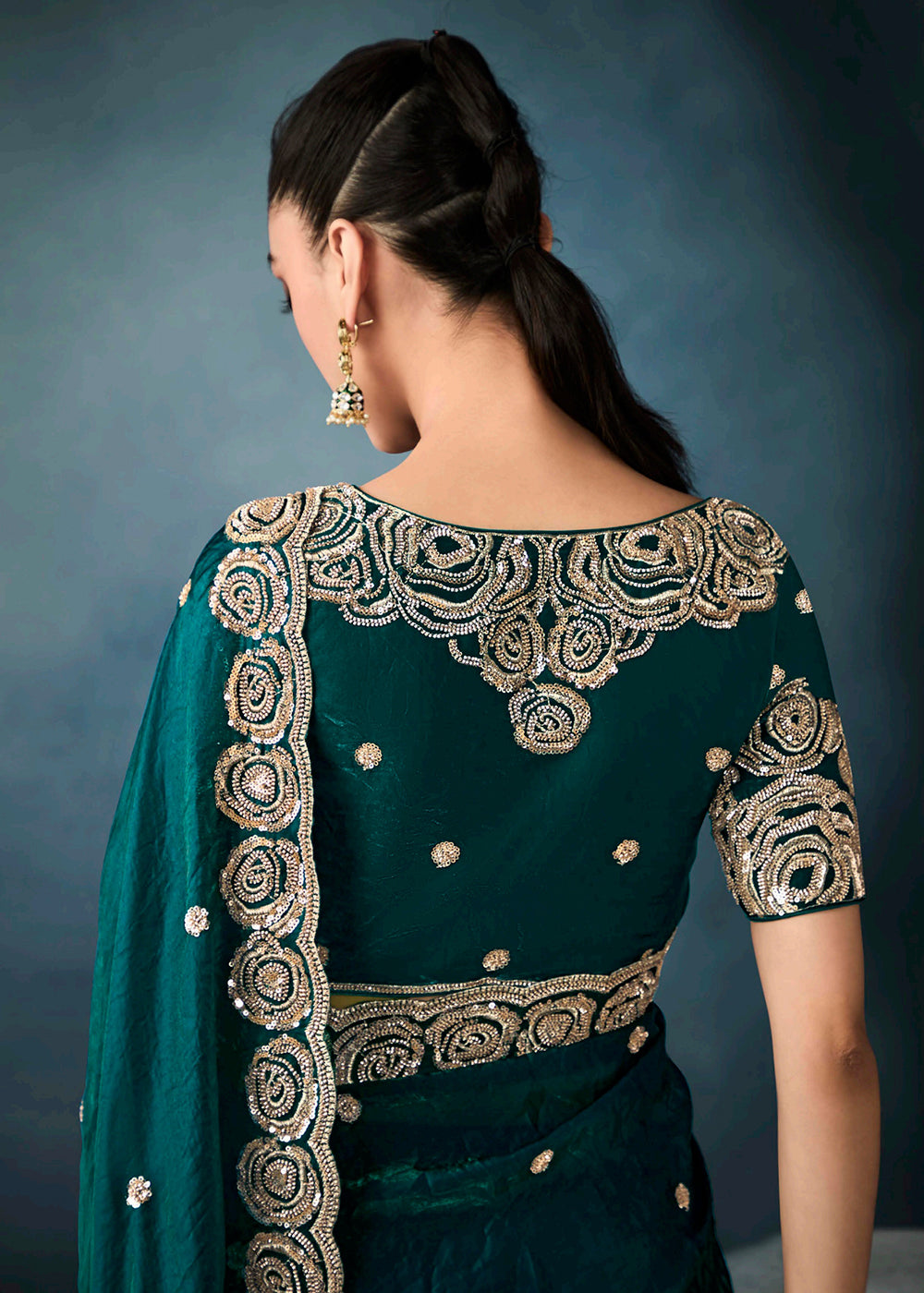 Radiant Green tissue saree with intricate handwork & cutwork embroidery. Includes matching blouse piece. Perfect for wedding & festivals. Shop Now.
