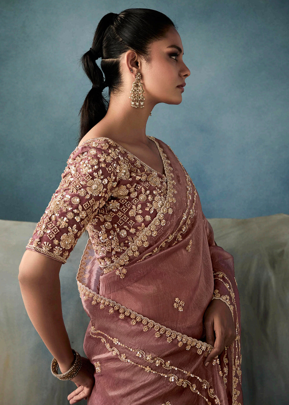 Radiant Mauve tissue saree with intricate handwork & cutwork embroidery. Includes matching blouse piece. Perfect for wedding & festivals. Shop Now.