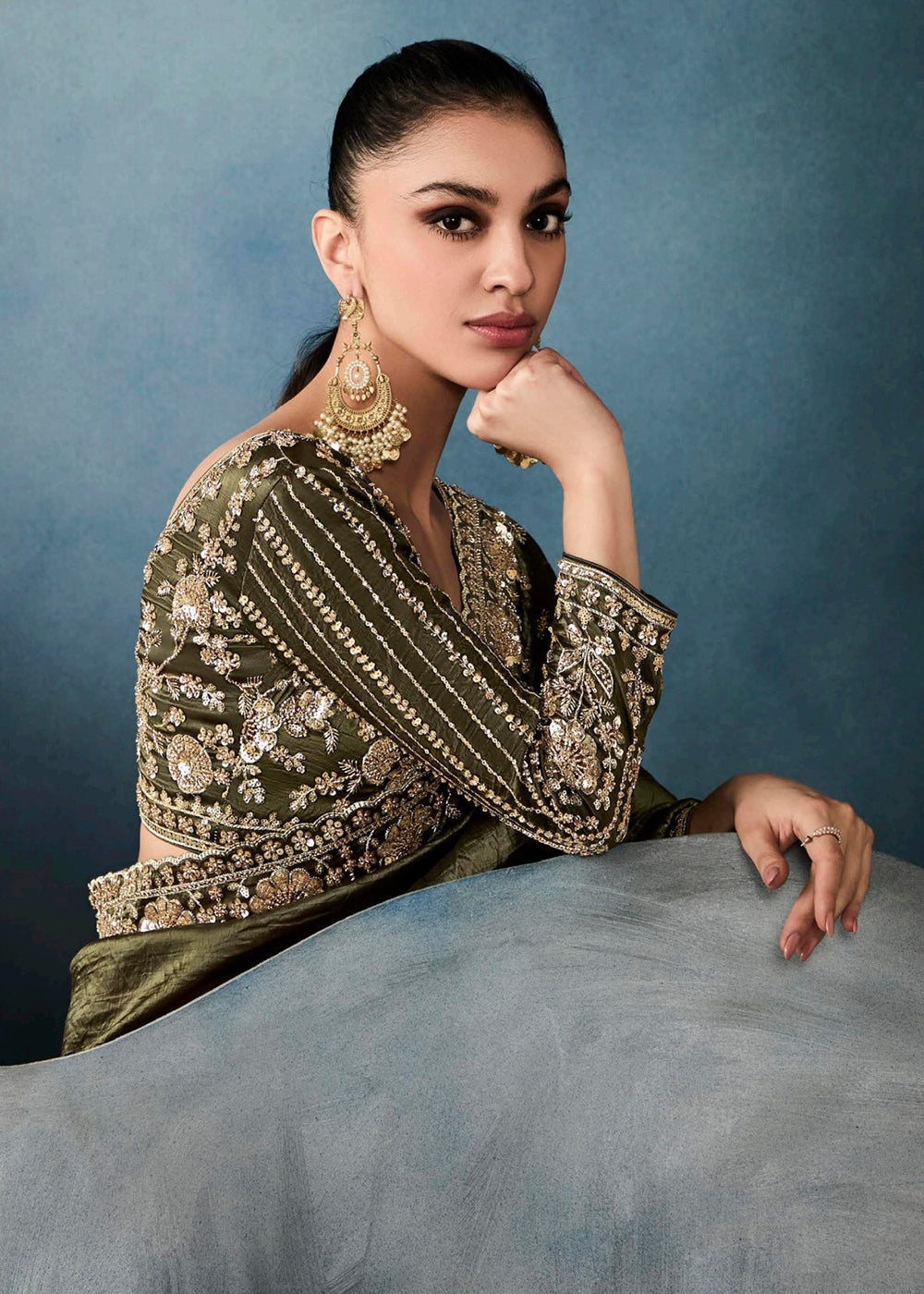 Radiant Green tissue saree with intricate handwork & cutwork embroidery. Includes matching blouse piece. Perfect for wedding & festivals. Shop Now.