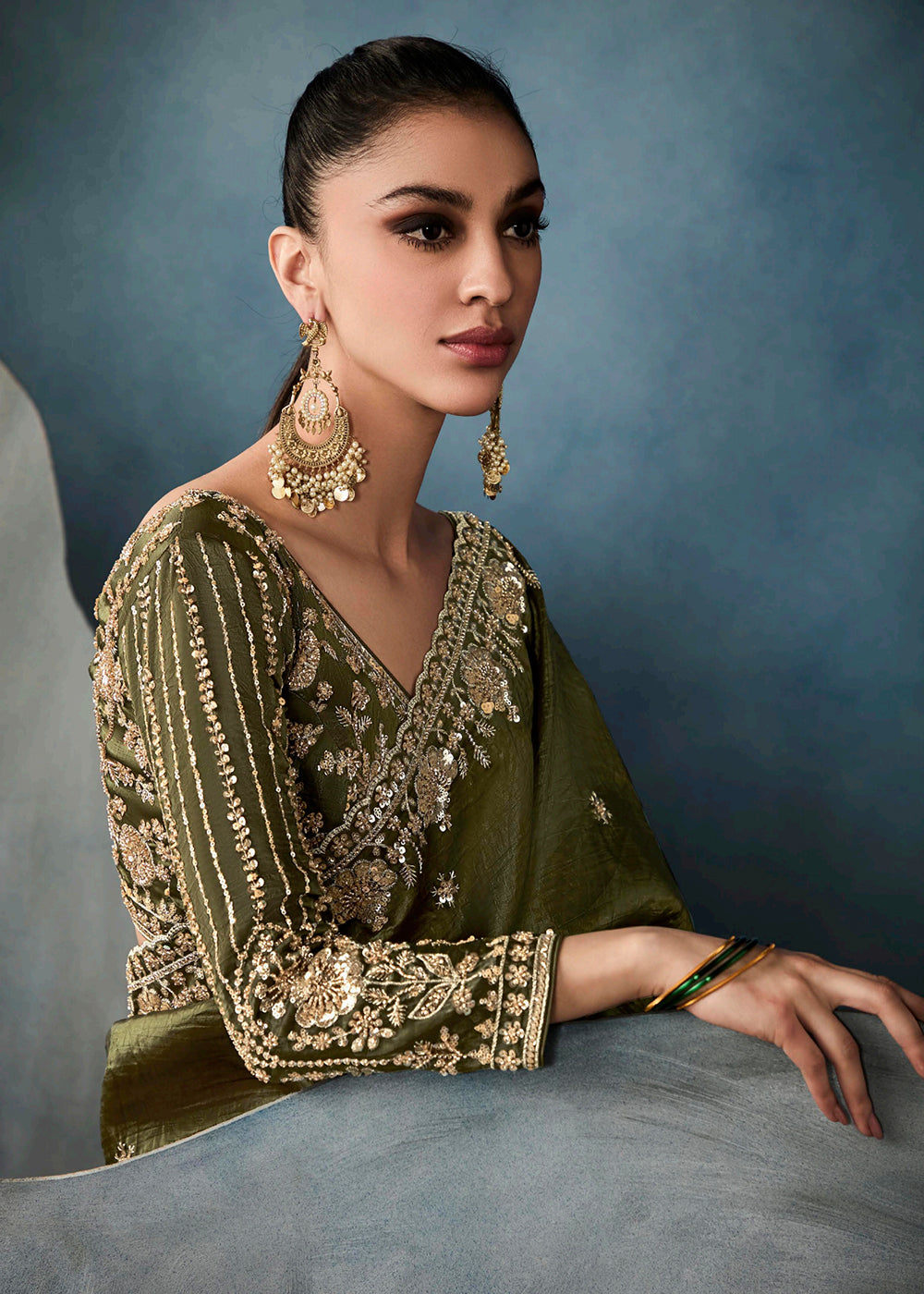 Radiant Green tissue saree with intricate handwork & cutwork embroidery. Includes matching blouse piece. Perfect for wedding & festivals. Shop Now.