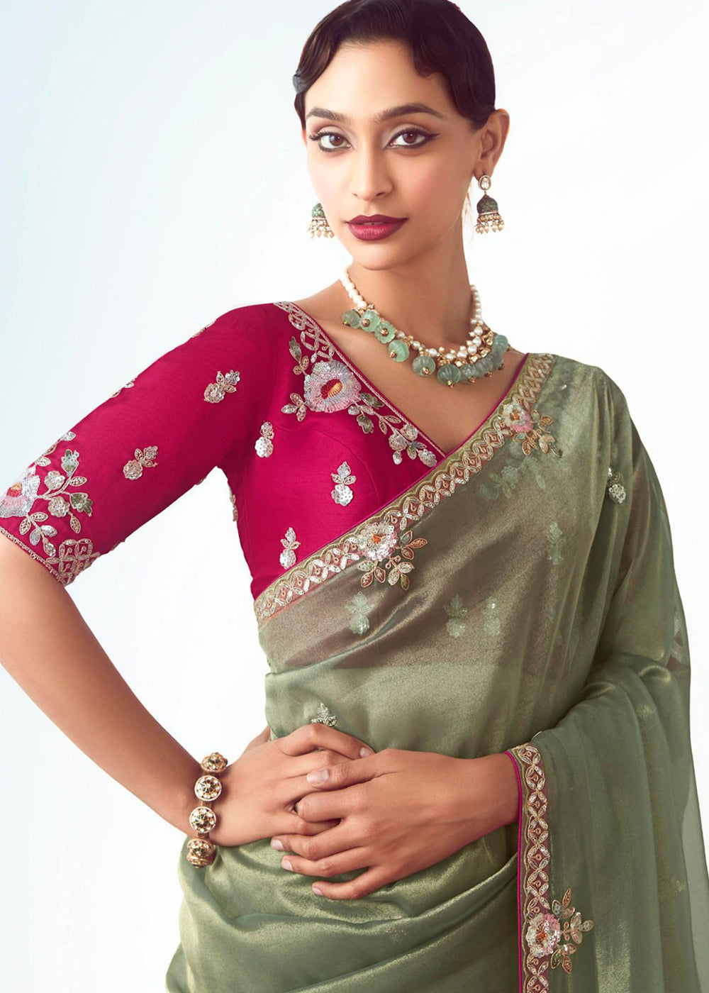 Buy Green & Pink Fancy Fabric Embroidered Designer Saree Online in USA, UK, Canada, France, Germany, Italy, Denmark, UAE, Singapore & Worldwide at Empress.