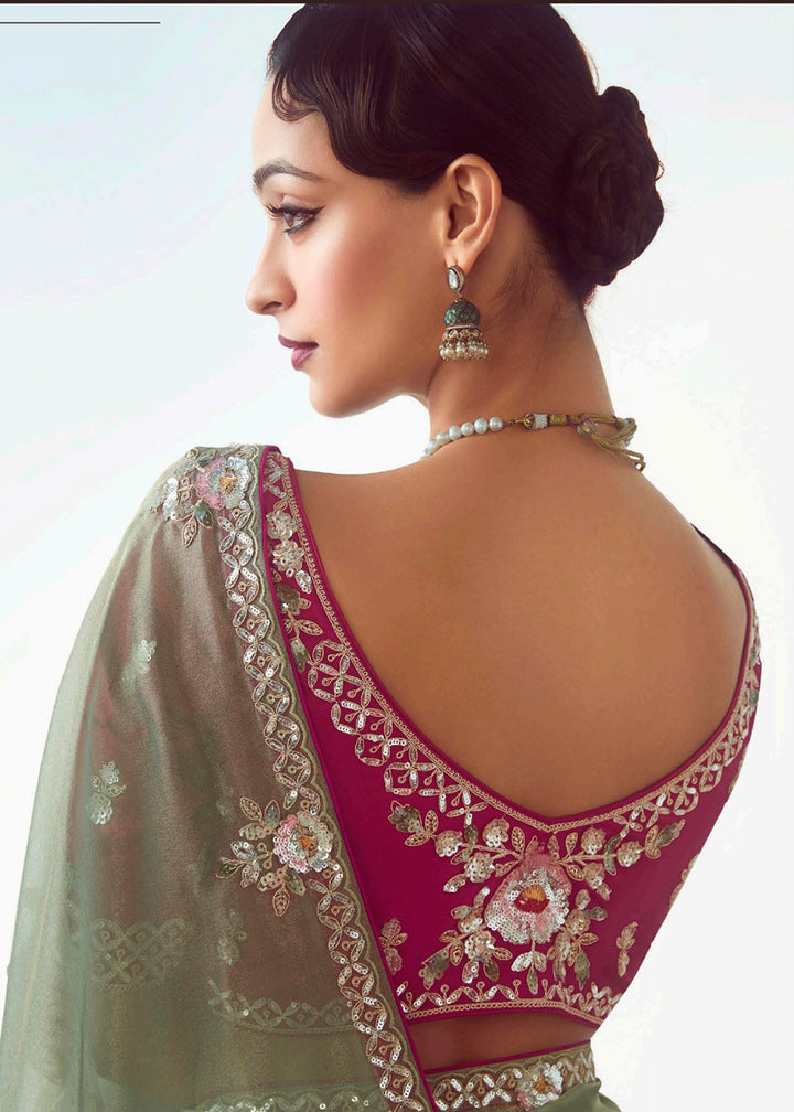 Buy Green & Pink Fancy Fabric Embroidered Designer Saree Online in USA, UK, Canada, France, Germany, Italy, Denmark, UAE, Singapore & Worldwide at Empress.
