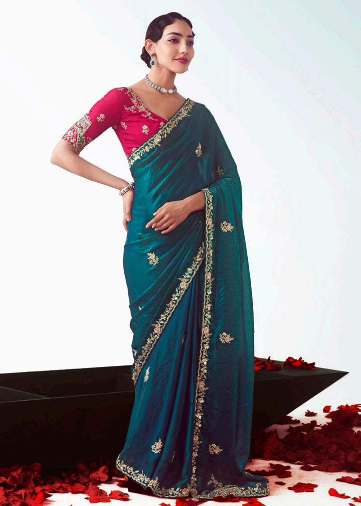 Buy Rama & Pink Fancy Fabric Embroidered Designer Saree Online in USA, UK, Canada, France, Germany, Italy, Denmark, UAE, Singapore & Worldwide at Empress.