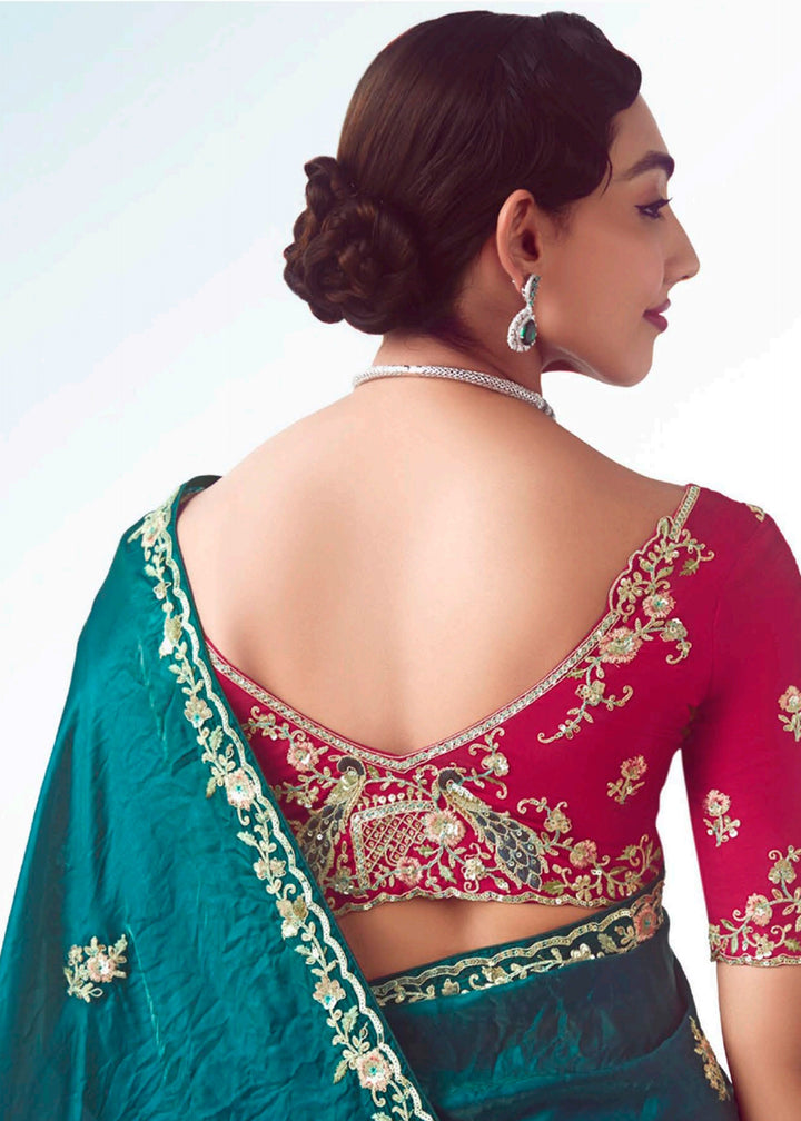 Buy Rama & Pink Fancy Fabric Embroidered Designer Saree Online in USA, UK, Canada, France, Germany, Italy, Denmark, UAE, Singapore & Worldwide at Empress.