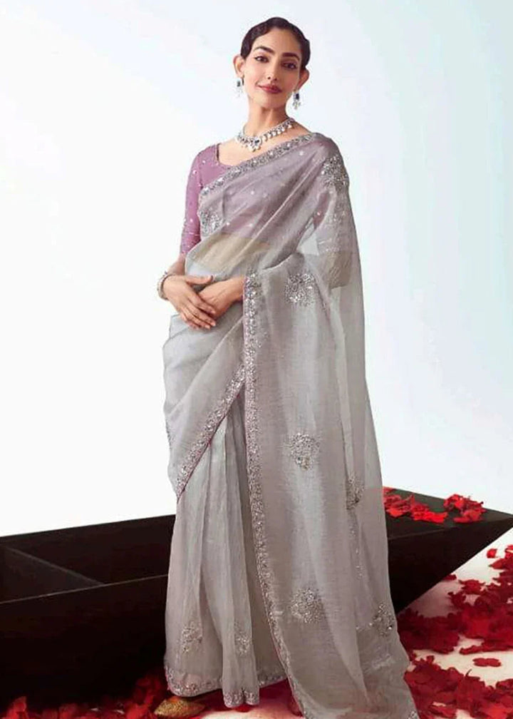 Buy Grey & Lilac Fancy Fabric Embroidered Designer Saree Online in USA, UK, Canada, France, Germany, Italy, Denmark, UAE, Singapore & Worldwide at Empress.