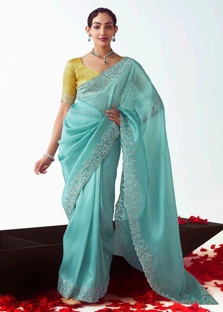 Buy Sky & Yellow Fancy Fabric Embroidered Designer Saree Online in USA, UK, Canada, France, Germany, Italy, Denmark, UAE, Singapore & Worldwide at Empress.