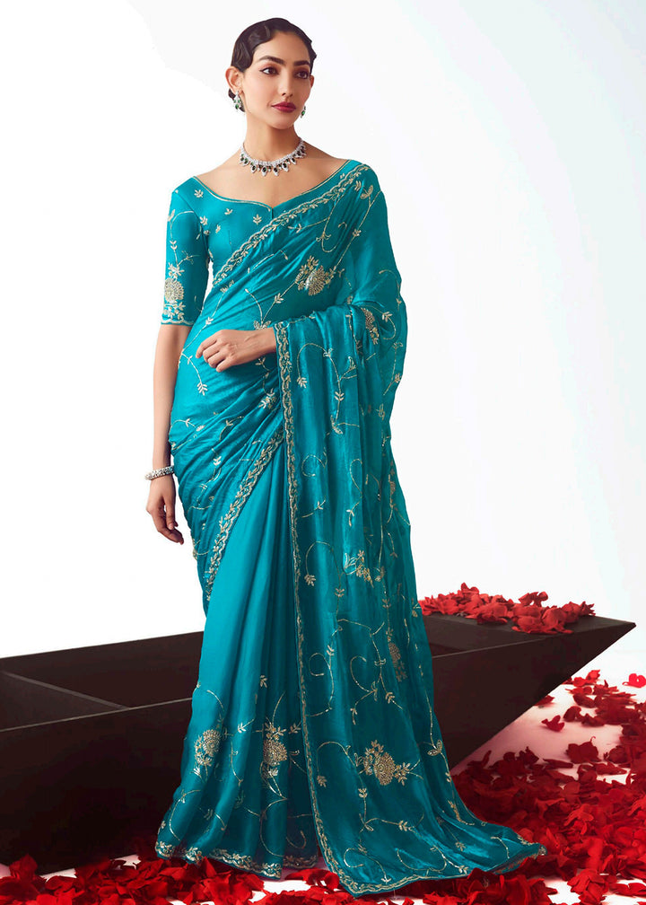 Buy Turquoise Fancy Fabric Embroidered Designer Saree Online in USA, UK, Canada, France, Germany, Italy, Denmark, UAE, Singapore, Austria & Worldwide at Empress.
