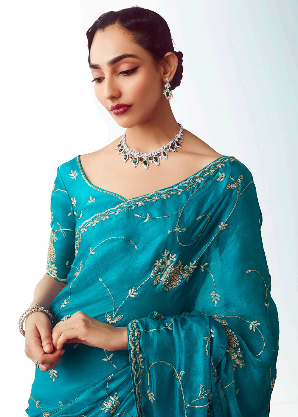 Buy Turquoise Fancy Fabric Embroidered Designer Saree Online in USA, UK, Canada, France, Germany, Italy, Denmark, UAE, Singapore, Austria & Worldwide at Empress.
