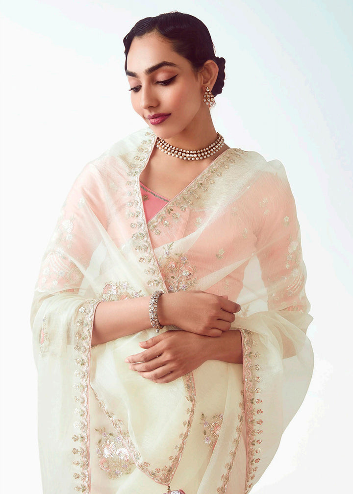 Buy Off White & Pink Fancy Fabric Embroidered Designer Saree Online in USA, UK, Canada, France, Germany, Italy, Denmark, UAE, Singapore & Worldwide at Empress
