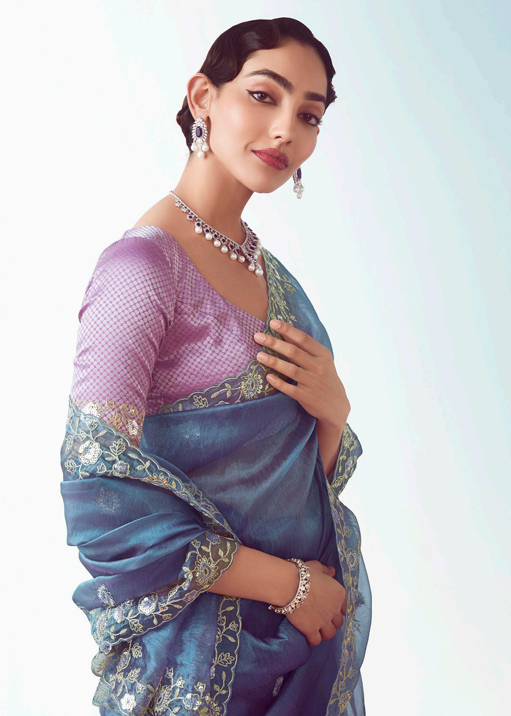 Buy Blue & Purple Fancy Fabric Embroidered Designer Saree Online in USA, UK, Canada, France, Germany, Italy, Denmark, UAE, Singapore & Worldwide at Empress