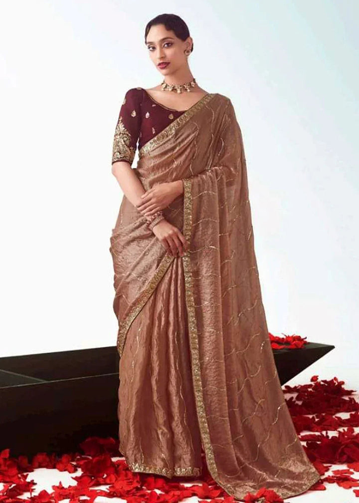 Buy Brown Fancy Fabric Embroidered Designer Saree Online in USA, UK, Canada, France, Germany, Italy, Denmark, UAE, Singapore, Australia & Worldwide at Empress.