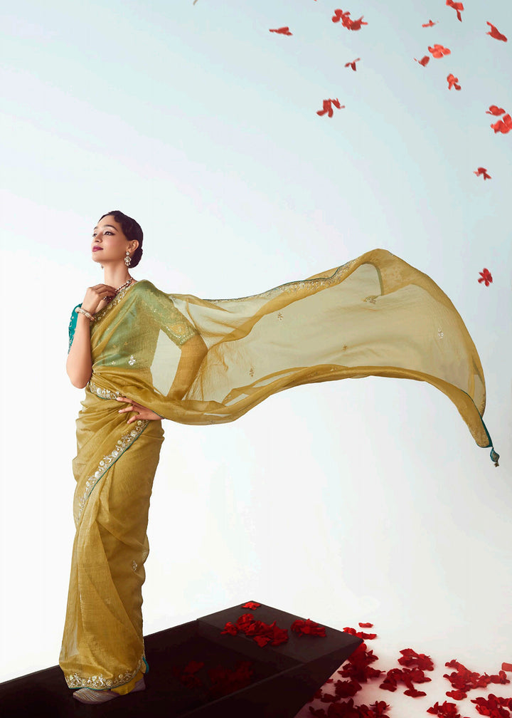 Buy Yellow & Teal Fancy Fabric Embroidered Designer Saree Online in USA, UK, Canada, France, Germany, Italy, Denmark, UAE, Singapore, Australia & Worldwide at Empress.