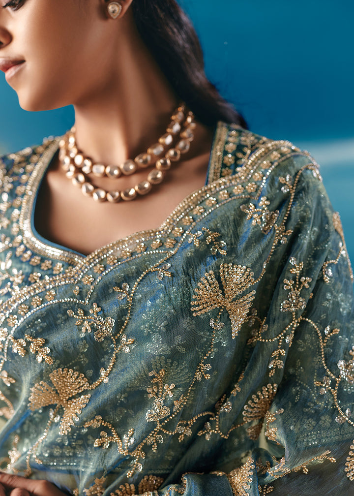 Buy Aqua Blue Satin Organza Fancy Designer Saree Online in US, UK, Canada, France, Germany, Denmark, Netherlands, Sweden, Greece, UAE & Worldwide at Empress.