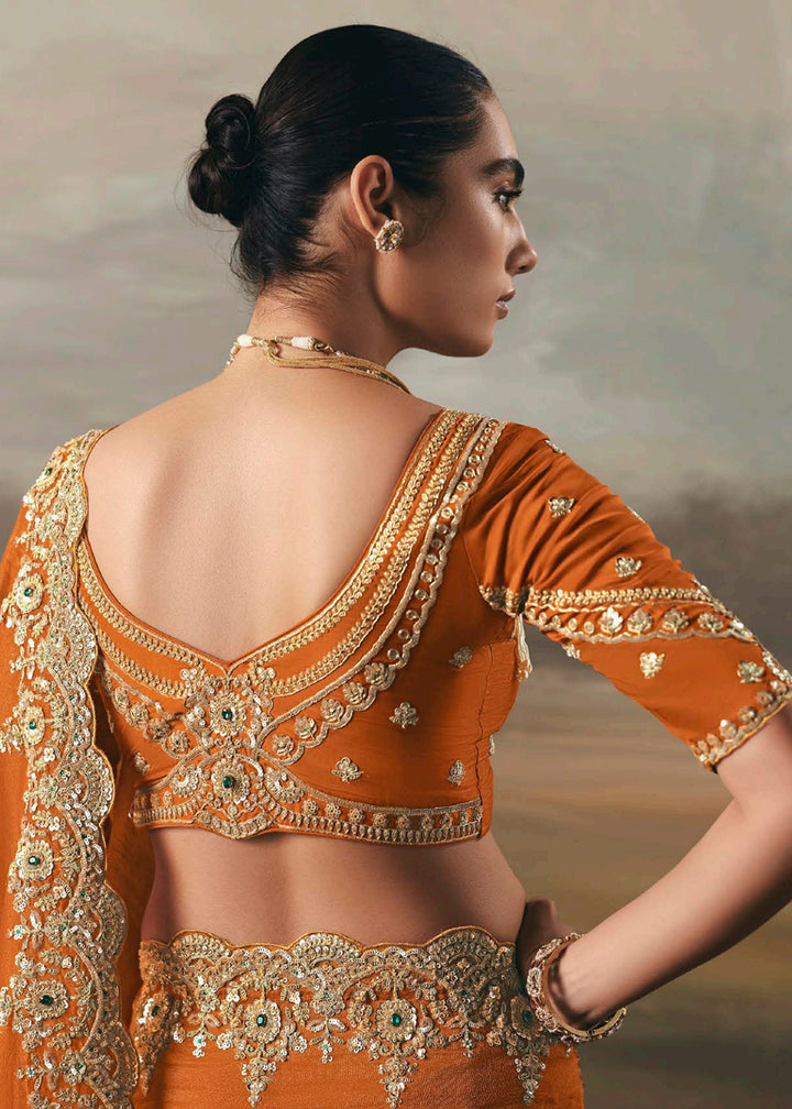Buy Orange Premium Tissue Zari Fabric Designer Saree Online in US, UK, Canada, France, Germany, Denmark, Netherlands, Sweden, Ireland & Worldwide at Empress.