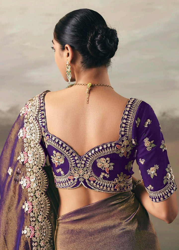 Buy Premium Tissue Zari Fabric Purple Designer Saree Online in US, UK, Canada, France, Germany, Denmark, Netherlands, Sweden, Ireland & Worldwide at Empress.