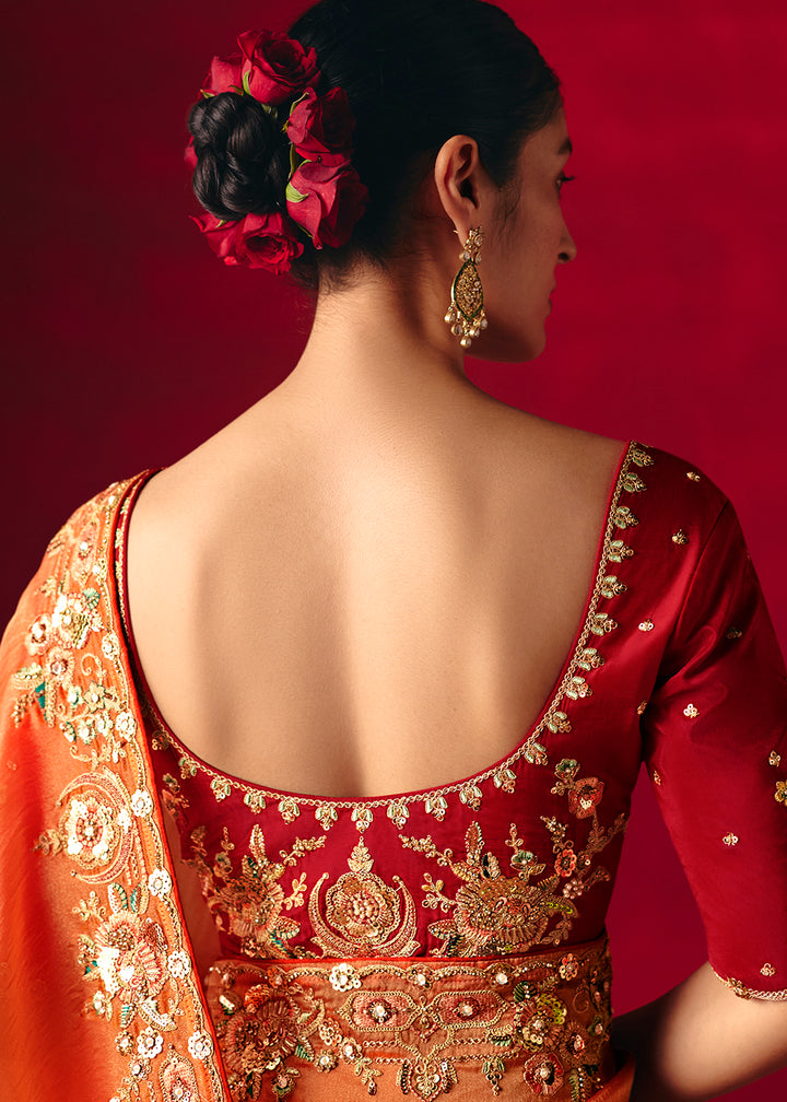 Buy Now Salmon Orange Fancy Material Wedding Designer Saree Online in US, UK, Canada, France, Germany, Denmark, Netherlands, Sweden, UAE & Worldwide at Empress.