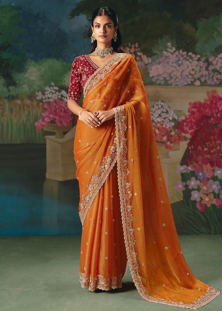 Buy Now Orange Premium Fancy Fabric Embellished Designer Saree Online in US, UK, Canada, France, Germany, Denmark, Netherland, Sweden & Worldwide at Empress.
