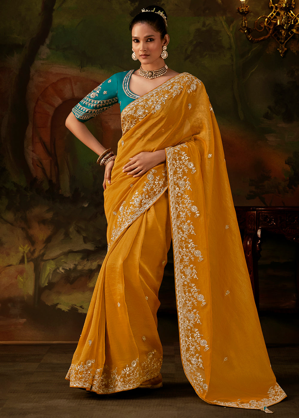 Buy Now Saffron Yellow Premium Designer Wedding Saree Online in US, UK, Canada, France, Germany, Denmark, Sweden, Italy, Netherlands, UAE & Worldwide at Empress.