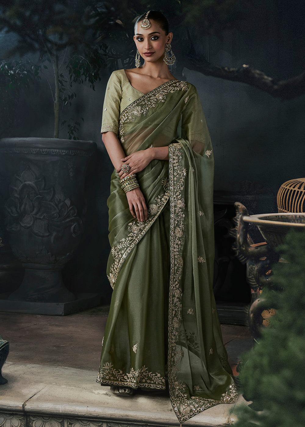 Buy Now Deep Olive Green Fancy Fabric Designer Wear Saree Online in US, UK, Canada, France, Germany, Denmark, Sweden, UAE, Greece, Italy & Worldwide at Empress.