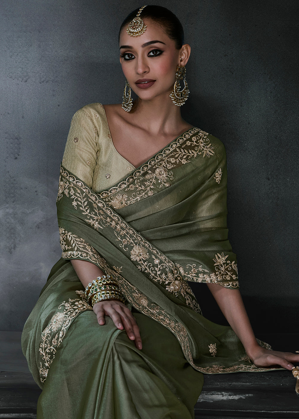 Buy Now Deep Olive Green Fancy Fabric Designer Wear Saree Online in US, UK, Canada, France, Germany, Denmark, Sweden, UAE, Greece, Italy & Worldwide at Empress.