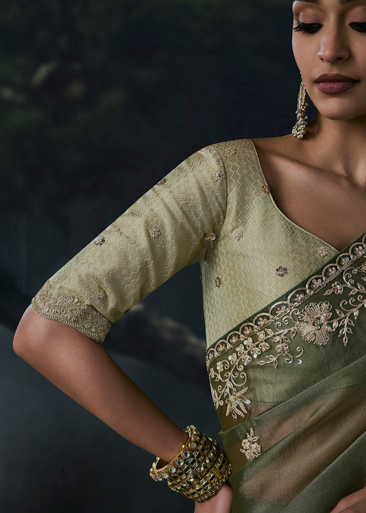 Buy Now Deep Olive Green Fancy Fabric Designer Wear Saree Online in US, UK, Canada, France, Germany, Denmark, Sweden, UAE, Greece, Italy &amp; Worldwide at Empress.