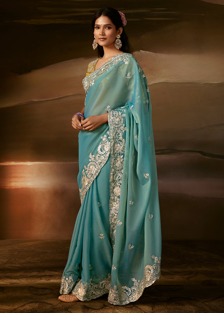 Buy Now Light Blue Zari Organza Designer Style Festive Saree Online in US, UK, Canada, France, Germany, Denmark, Sweden, Australia, UAE &amp; Worldwide at Empress.
