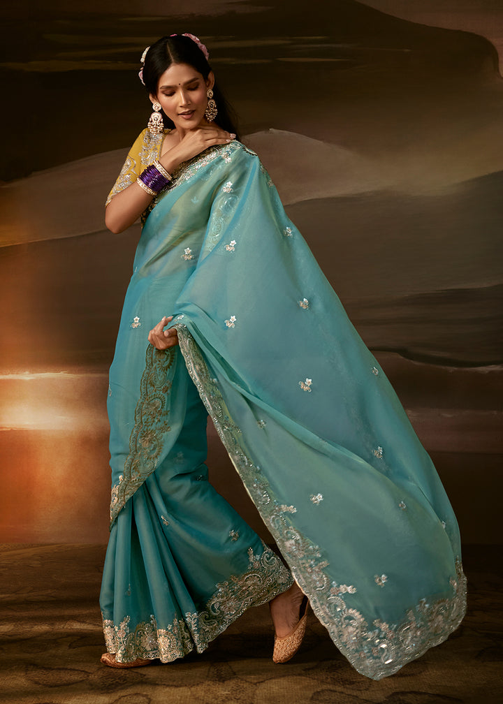 Buy Now Light Blue Zari Organza Designer Style Festive Saree Online in US, UK, Canada, France, Germany, Denmark, Sweden, Australia, UAE &amp; Worldwide at Empress.