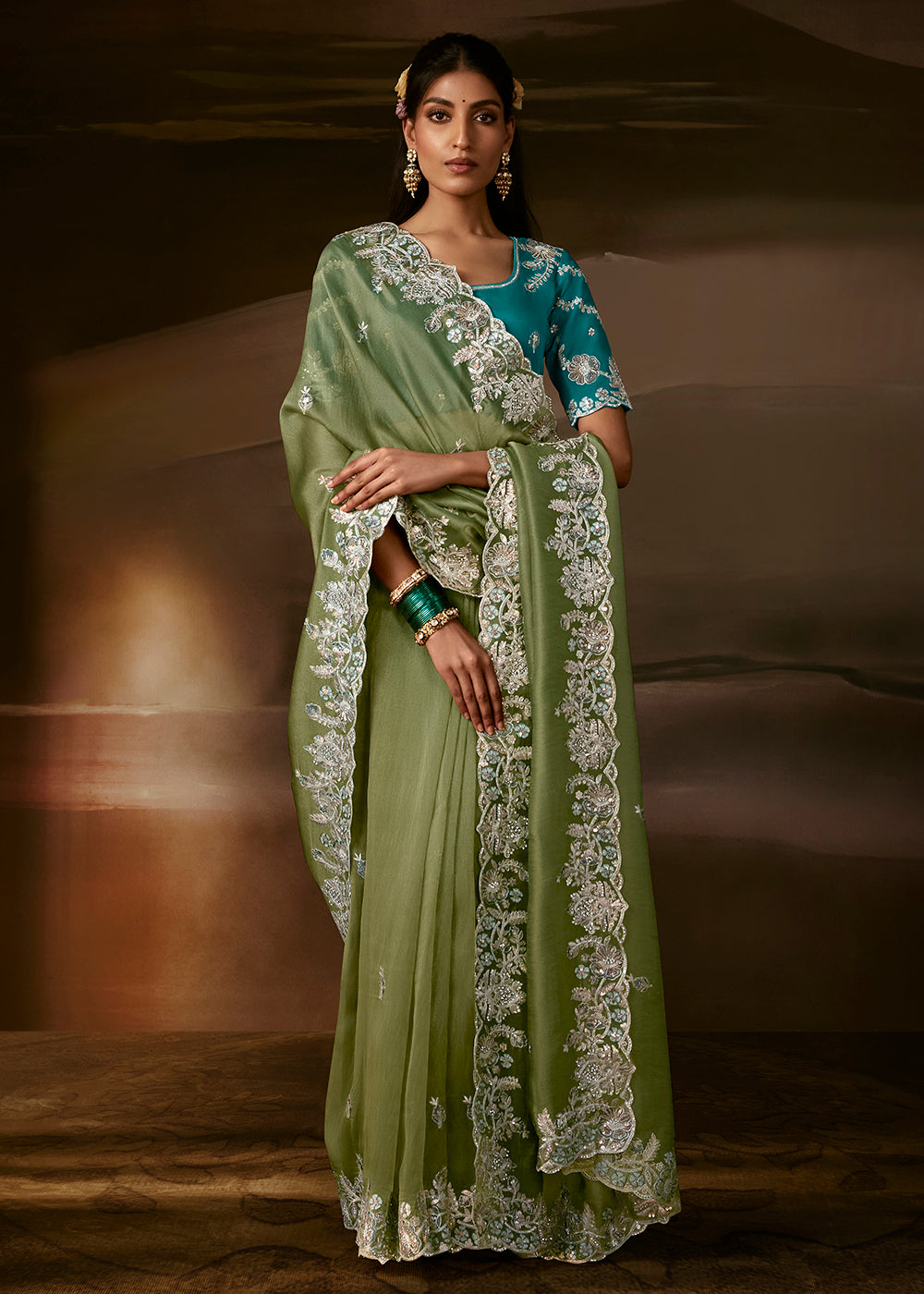 Buy Now Pista Green Zari Organza Designer Style Festive Saree Online in US, UK, Canada, France, Germany, Denmark, Sweden, Australia, UAE & Worldwide at Empress.