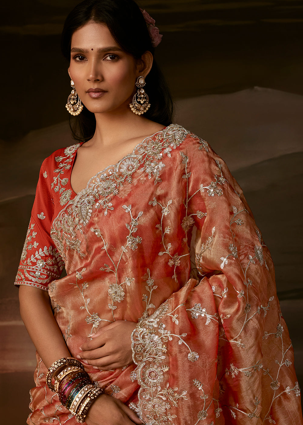 Buy Now Peachy Orange Zari Organza Designer Style Festive Saree Online in US, UK, Canada, France, Germany, Denmark, Sweden, Australia & Worldwide at Empress.