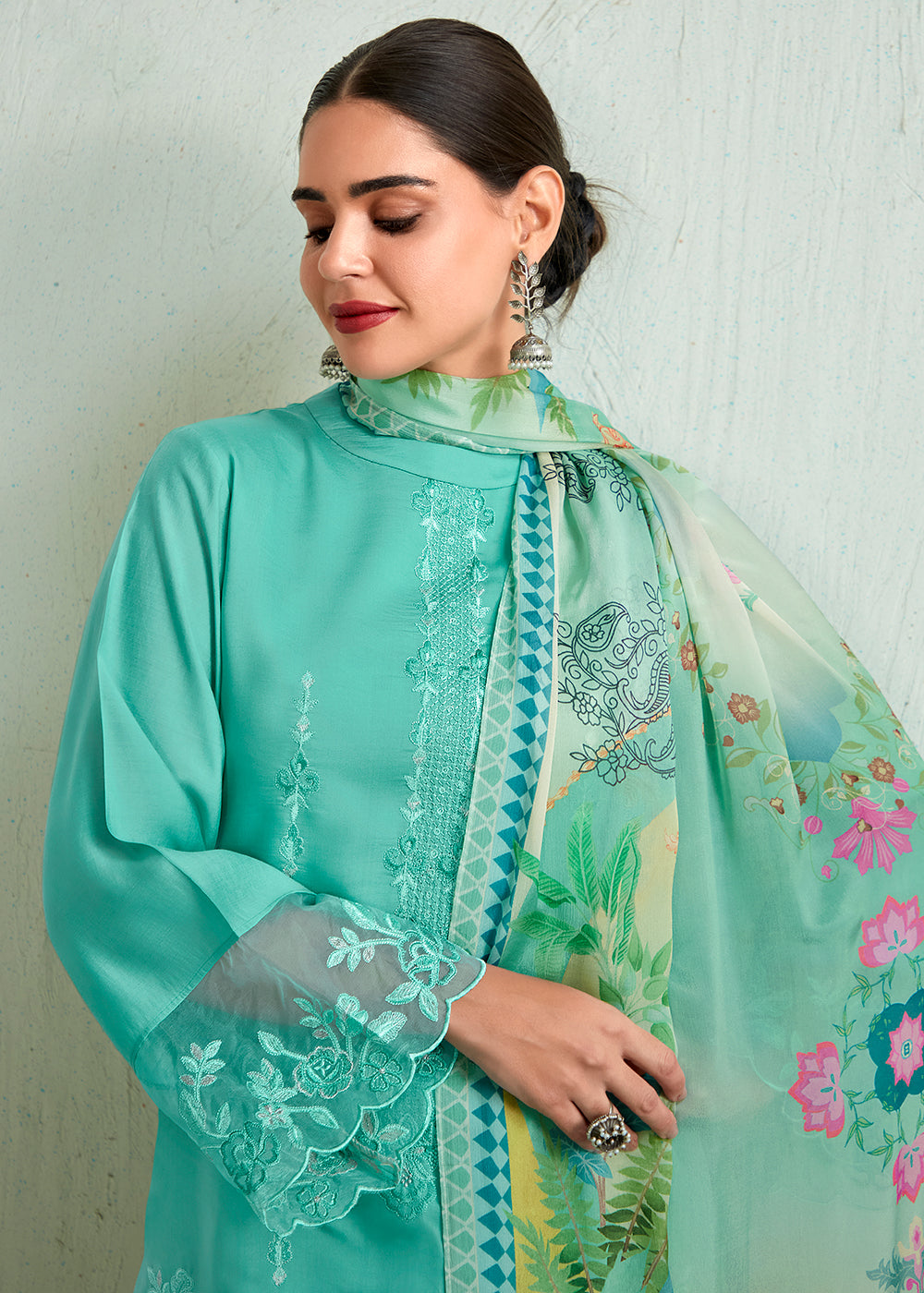 Buy Now Turquoise Blue Pure Muslin Resham Embroidered Salwar Suit Online in USA, UK, Canada, Germany, Australia & Worldwide at Empress Clothing.