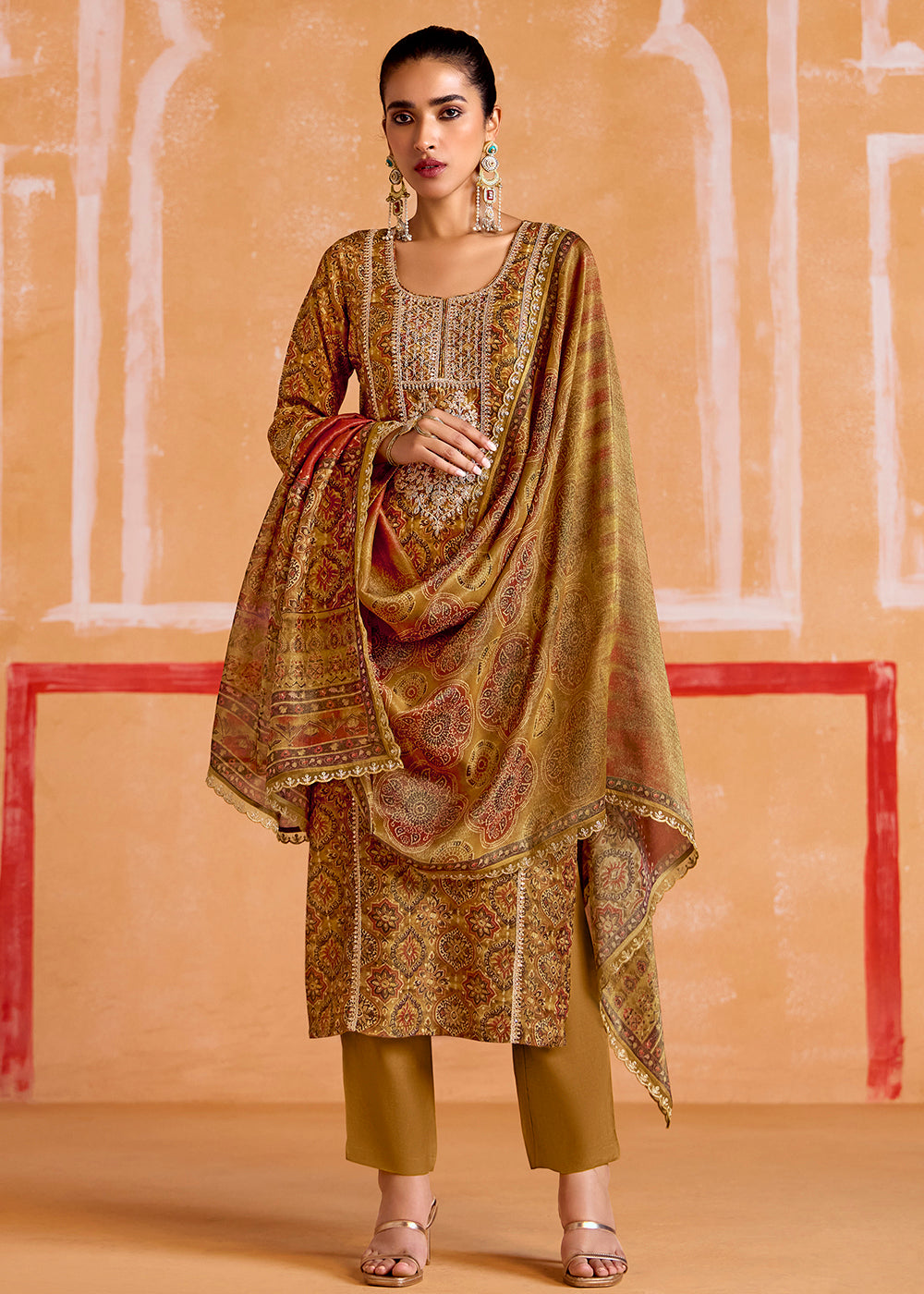 Buy Now Mustard Pure Muslin Embroidered Pakistani Style Suit Online in USA, UK, Canada, Germany, Italy & Worldwide at Empress Clothing. 