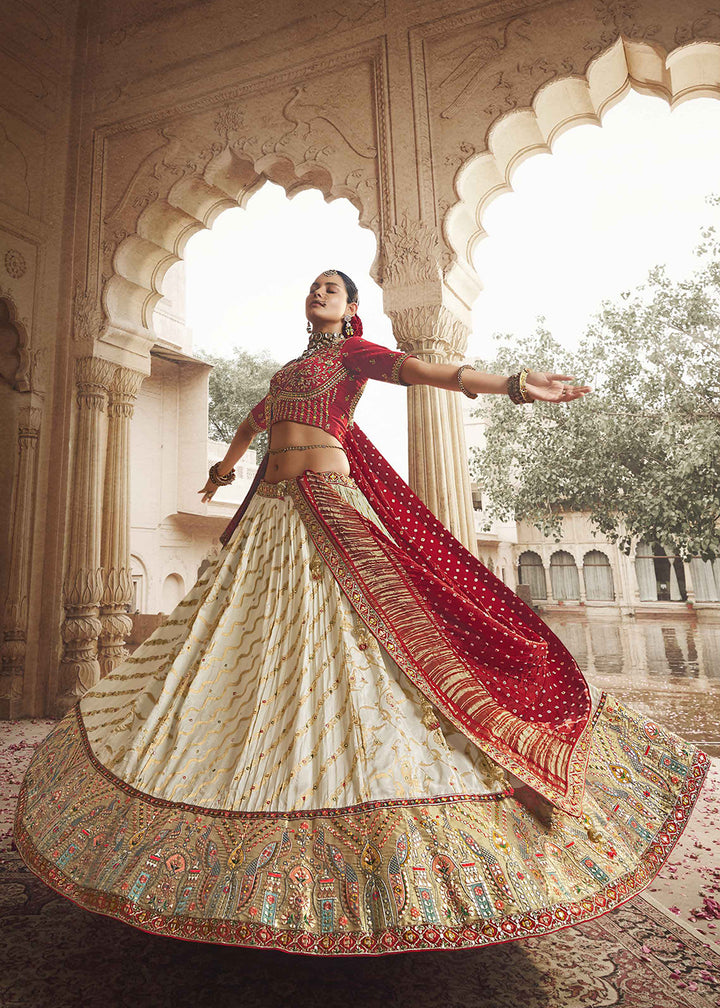 Buy Now Heavy Viscose Cream & Red Embroidered Bridal Lehenga Choli Online in USA, UK, Canada & Worldwide at Empress Clothing. 