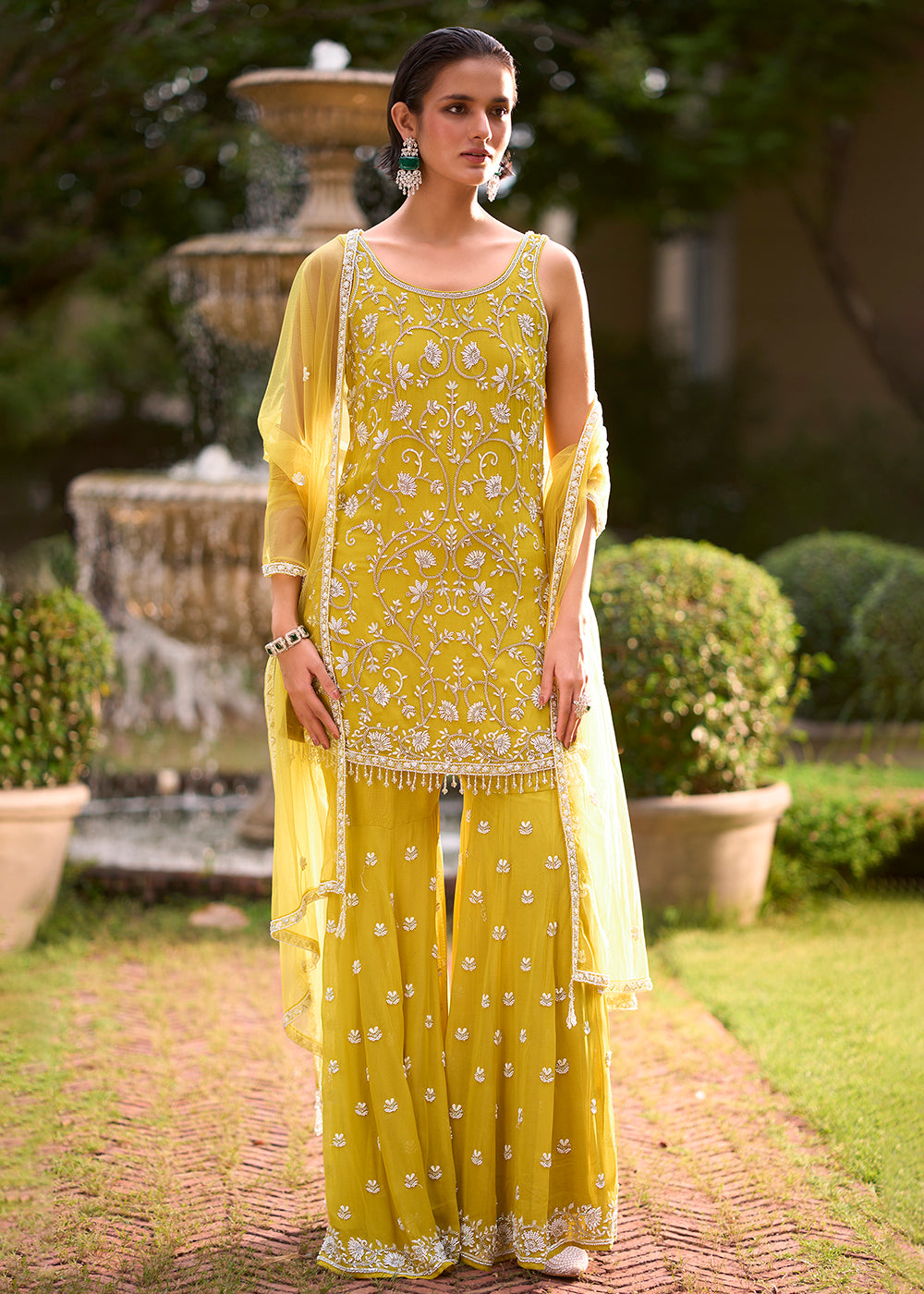 Shop Now Yellow Moti & Cutdana with Floral Work Party Sharara Suit Online at Empress in US, UK, Canada, Italy, Germany, France, Greece, Sweden, UAE & Worldwide.