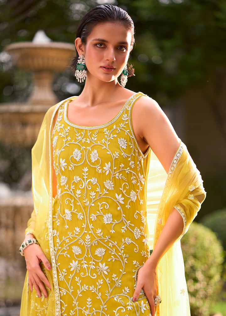 Shop Now Yellow Moti &amp; Cutdana with Floral Work Party Sharara Suit Online at Empress in US, UK, Canada, Italy, Germany, France, Greece, Sweden, UAE &amp; Worldwide.