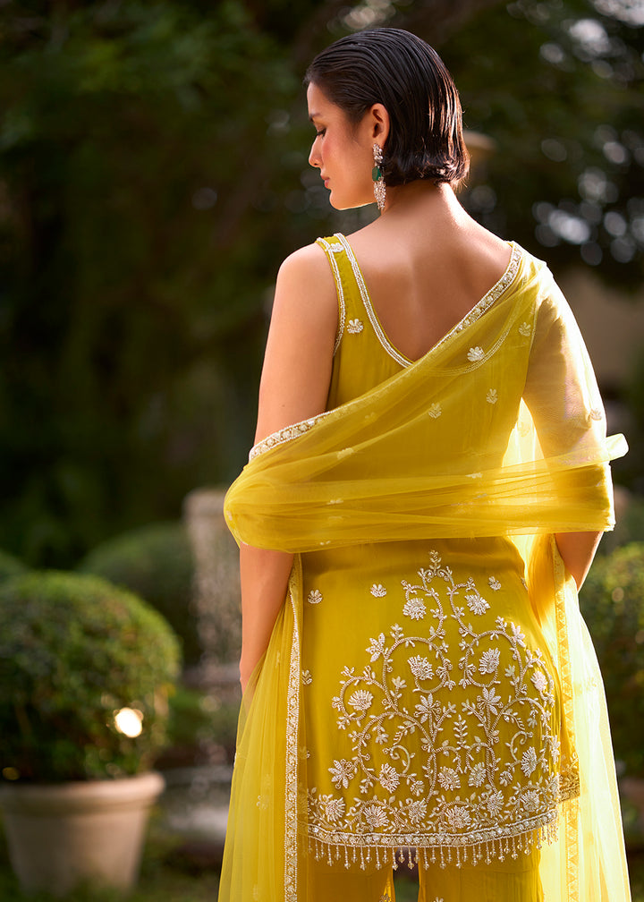 Shop Now Yellow Moti &amp; Cutdana with Floral Work Party Sharara Suit Online at Empress in US, UK, Canada, Italy, Germany, France, Greece, Sweden, UAE &amp; Worldwide.