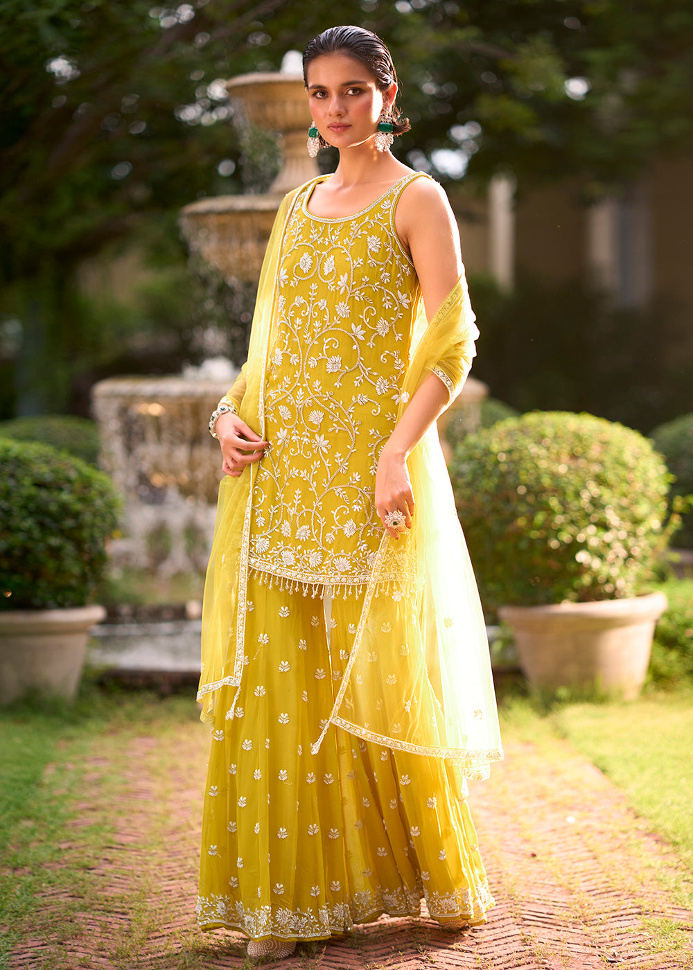 Shop Now Yellow Moti &amp; Cutdana with Floral Work Party Sharara Suit Online at Empress in US, UK, Canada, Italy, Germany, France, Greece, Sweden, UAE &amp; Worldwide.