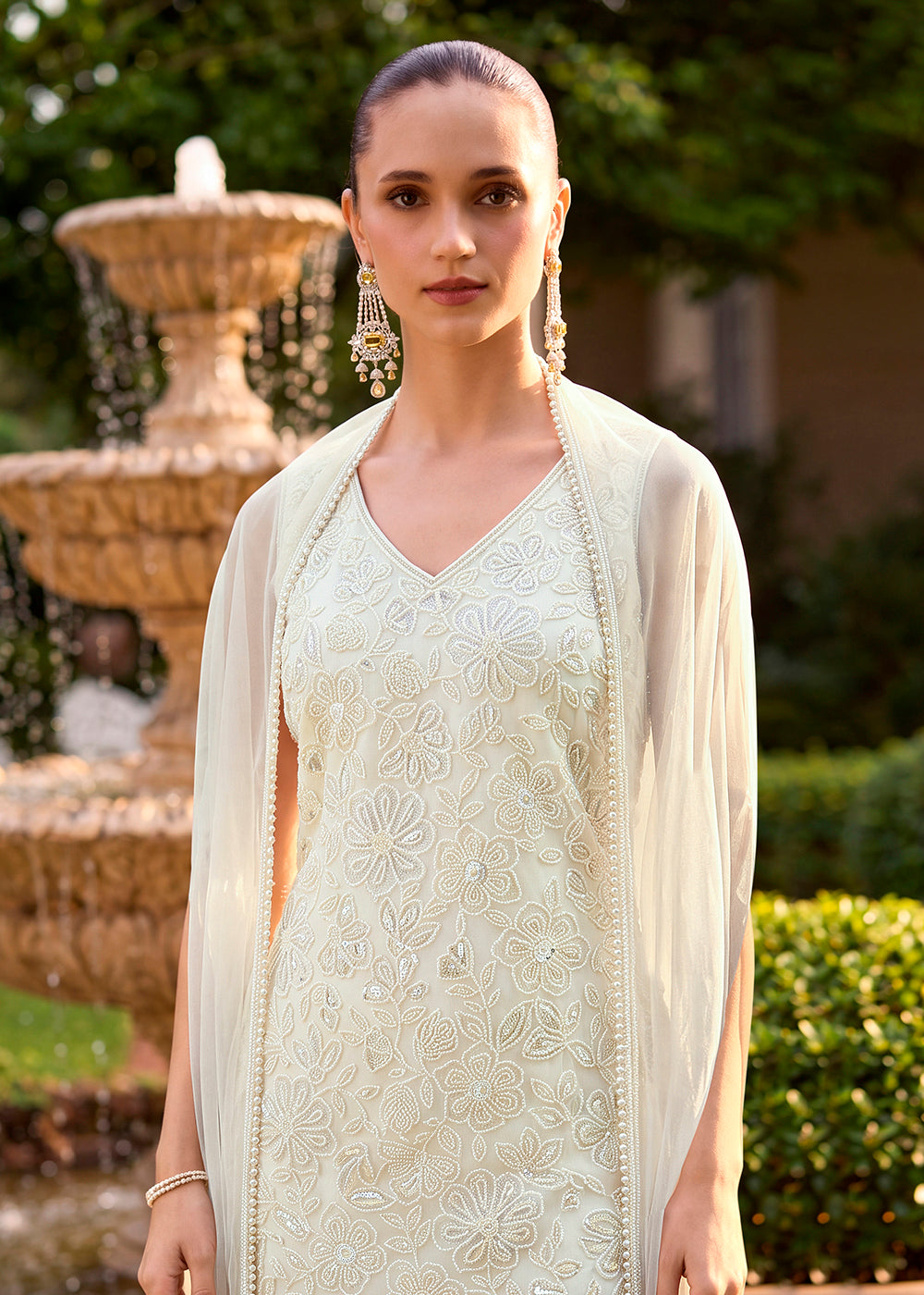 Shop Now Cream Moti &amp; Cutdana with Floral Work Party Sharara Suit Online at Empress in US, UK, Canada, Italy, Germany, France, Greece, Sweden, UAE &amp; Worldwide.