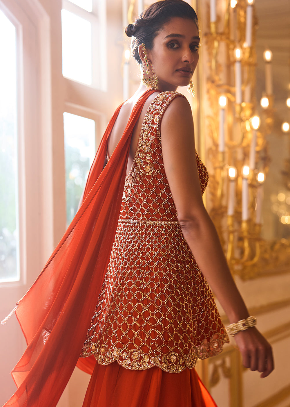 Buy Now Sienna Orange Embroidered Peplum Style Set Online in US, UK, Canada, Netherlands, Germany, Italy, France, Greece, Denmark, Spain & Worldwide at Empress.